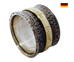 "Gestalte deinen eigenen Spinning Ring aus original DM Münzen mit Wunschgravur!"<br>wurde zur Wunschliste hinzugefügt